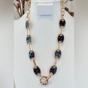 Laura Ford Oval Blue w/gold multi color metallic flecks necklace,post earrings